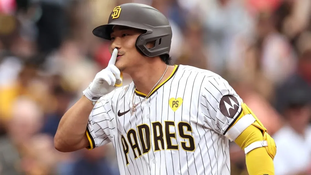 Ha-Seong Kim #7 of the San Diego Padres reacts after hitting a three-run homerun during the second inning of a game against the Arizona Diamondbacks at Petco Park on June 08, 2024 in San Diego, California. (Photo by Sean M. Haffey/Getty Images)