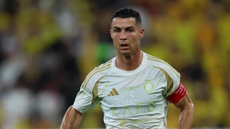 Cristiano Ronaldo scores Al Nassr's second goal against Al Okhdood.