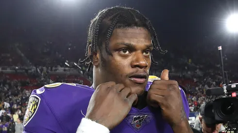 Lamar Jackson #8 of the Baltimore Ravens walks onto the field after a game against the Los Angeles Rams.