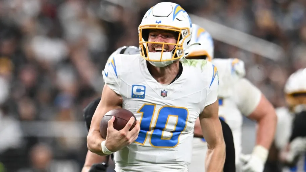 Justin Herbert #10 of the Los Angeles Chargers runs for a 41-yard gain against the Las Vegas Raiders in the fourth quarter of their game on January 05, 2025. (Source: Candice Ward/Getty Images)