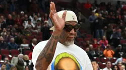 Former Chicago Bulls Dennis Rodman waves to the crowd as he delivers the game ball before a NBA game between the Chicago Bulls and the Miami Heat on November 18, 2023 at United Center in Chicago, Illinois.