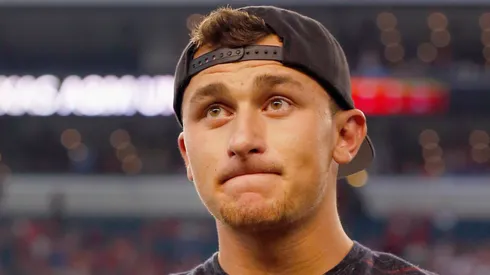 Johnny Manziel #2 of the Cleveland Browns reacts after receiving his Aggie Ring during half time of the Southwest Classic at AT&T Stadium on September 27, 2014 in Arlington, Texas.