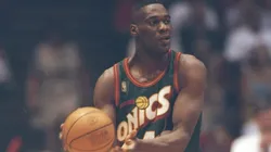 Seattle Supersonics star looks to pass the ball during a game against the Houston Rockets at the Summit in Houston, Texas. The Supersonics won the game 100-94.