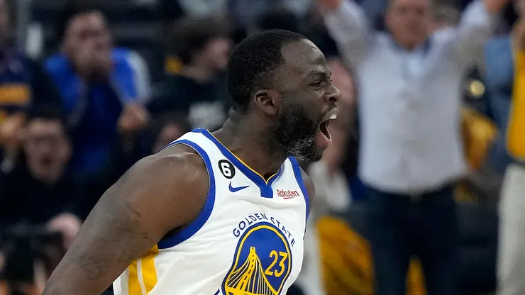 Draymond Green #23 of the Golden State Warriors reacts after a three point basket against the Los Angeles Lakers