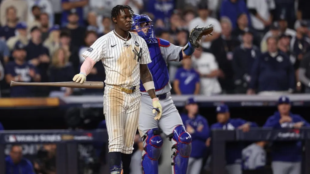 Jazz Chisholm Jr. #13 of the New York Yankees is walked during the eighth inning of Game Five of the 2024 World Series against the Los Angeles Dodgers at Yankee Stadium on October 30, 2024 in the Bronx borough of New York City. (Photo by Elsa/Getty Images)