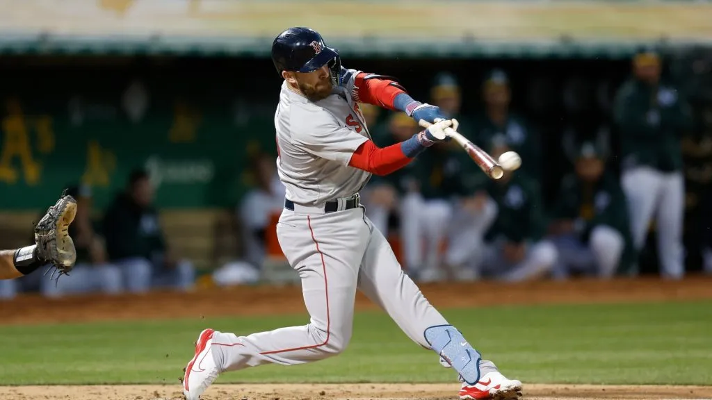 Trevor Story #10 of the Boston Red Sox hits an RBI double in the top of the third inning against the Oakland Athletics at Oakland Coliseum on April 01, 2024 in Oakland, California. (Photo by Lachlan Cunningham/Getty Images)