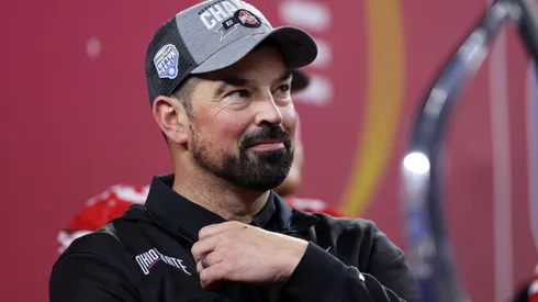 Head coach Ryan Day of the Ohio State Buckeyes celebrates during the trophy ceremony after beating the Texas Longhorns 28-14 to win the Goodyear Cotton Bowl at AT&T Stadium on January 10, 2025 in Arlington, Texas.