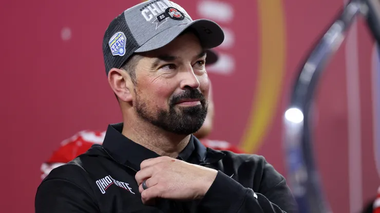 Head coach Ryan Day of the Ohio State Buckeyes celebrates during the trophy ceremony after beating the Texas Longhorns 28-14 to win the Goodyear Cotton Bowl at AT&T Stadium on January 10, 2025 in Arlington, Texas.