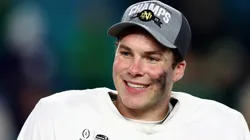 Riley Leonard #13 of the Notre Dame Fighting Irish celebrates after defeating the Penn State Nittany Lions 27-24 in the Capital One Orange Bowl at Hard Rock Stadium on January 09, 2025 in Miami Gardens, Florida.