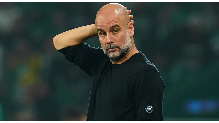 Pep Guardiola, Manager of Manchester City, looks on during the UEFA Champions League 2024/25 League Phase MD4 match between Sporting Clube de Portugal and Manchester City at Estadio Jose Alvalade on November 05, 2024 in Lisbon, Portugal.