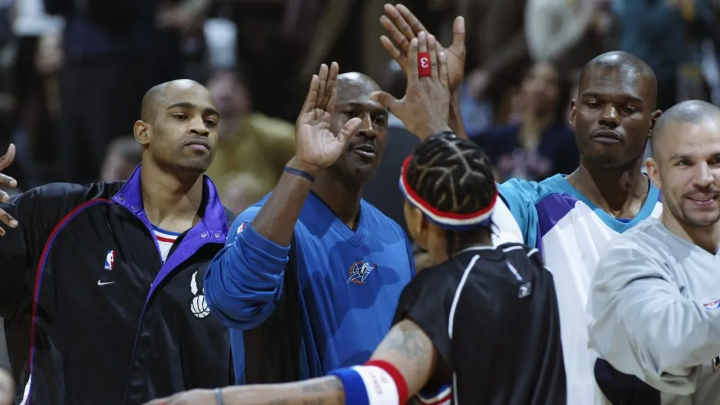 Allen Iverson (Philadelphia 76ers) greets Michael Jordan (Washington Wizards) during the 2003 NBA All-Star Game.