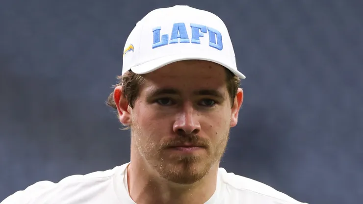 Justin Herbert #10 of the Los Angeles Chargers warms up prior to a game against the Houston Texans during the AFC Wild Card Playoffs at NRG Stadium on January 11, 2025 in Houston, Texas.