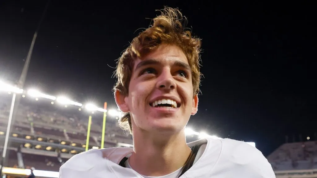 Arch Manning #16 of the Texas Longhorns celebrates after the game against the Texas A&amp;M Aggies at Kyle Field on November 30, 2024 in College Station, Texas.