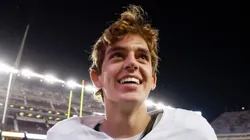 Arch Manning #16 of the Texas Longhorns celebrates after the game against the Texas A&M Aggies at Kyle Field on November 30, 2024 in College Station, Texas.