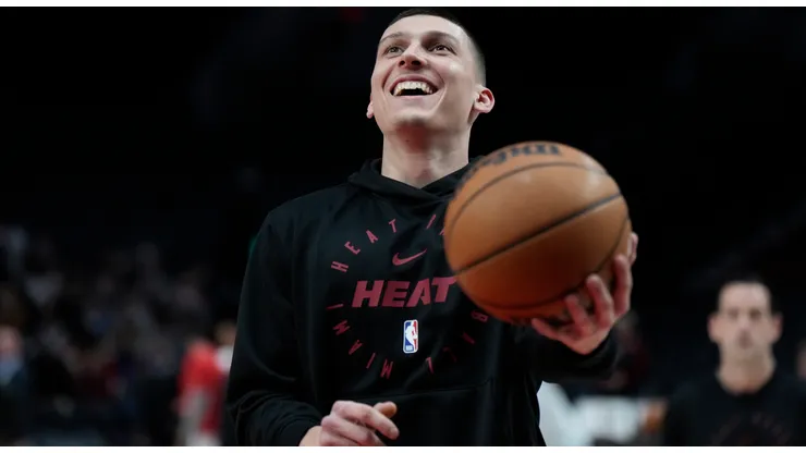 Tyler Herro #14 of the Miami Heat smiles during warm ups before the game against the Portland Trail Blazers at Moda Center on January 11, 2025 in Portland, Oregon.