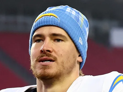 What happened to Justin Herbert and why is he playing with a glove over his left hand?