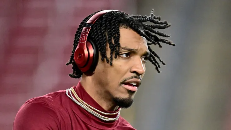 Jayden Daniels #5 of the Washington Commanders warms up prior to the NFC Wild Card Playoff against the Tampa Bay Buccaneers at Raymond James Stadium on January 12, 2025 in Tampa, Florida.