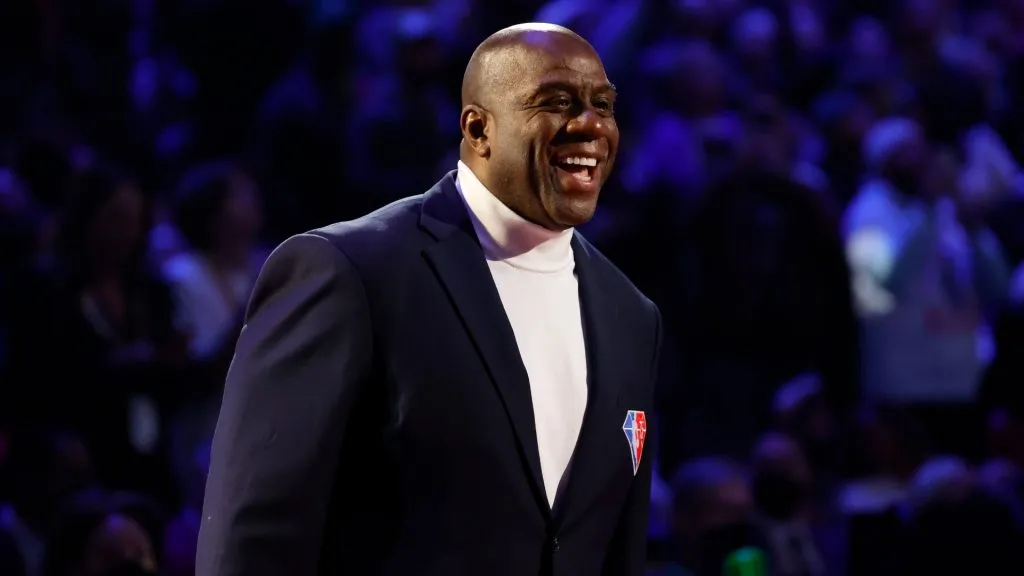 Earvin “Magic” Johnson reacts after being introduced as part of the NBA 75th Anniversary Team during the 2022 NBA All-Star Game. (Source: Tim Nwachukwu/Getty Images)