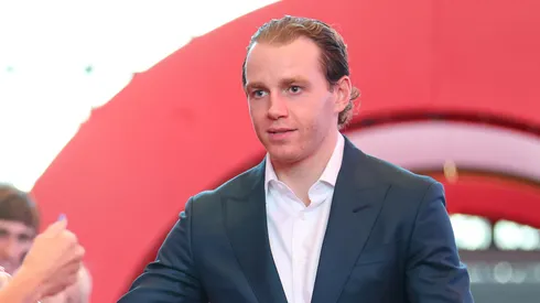 Patrick Kane, former #88 of the Chicago Blackhawks high fives fans as he arrives to the red carpet prior to the game against the Detroit Red Wings at United Center on October 21, 2022 in Chicago, Illinois.