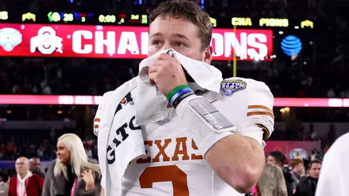 Quinn Ewers #3 of the Texas Longhorns walks off the field after losing to the Ohio State Buckeyes 28-14 in the Goodyear Cotton Bowl at AT&T Stadium on January 10, 2025 in Arlington, Texas.