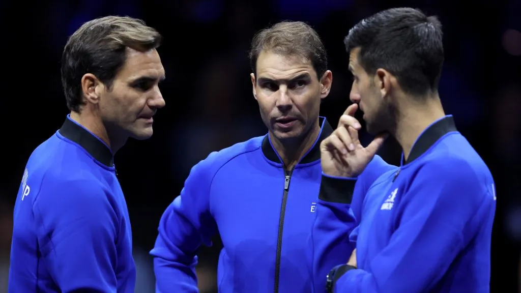 Roger Federer, Rafael Nadal and Novak Djokovic of Team Europe talk on centre court during Day One of the Laver Cup. (Julian Finney/Getty Images for Laver Cup)