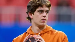 Arch Manning #16 of the Texas Longhorns warms up prior to the Chick-fil-A Peach Bowl Arizona State Sun Devils at Mercedes-Benz Stadium on January 01, 2025 in Atlanta, Georgia.
