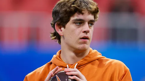 Arch Manning #16 of the Texas Longhorns warms up prior to the Chick-fil-A Peach Bowl Arizona State Sun Devils at Mercedes-Benz Stadium on January 01, 2025 in Atlanta, Georgia.