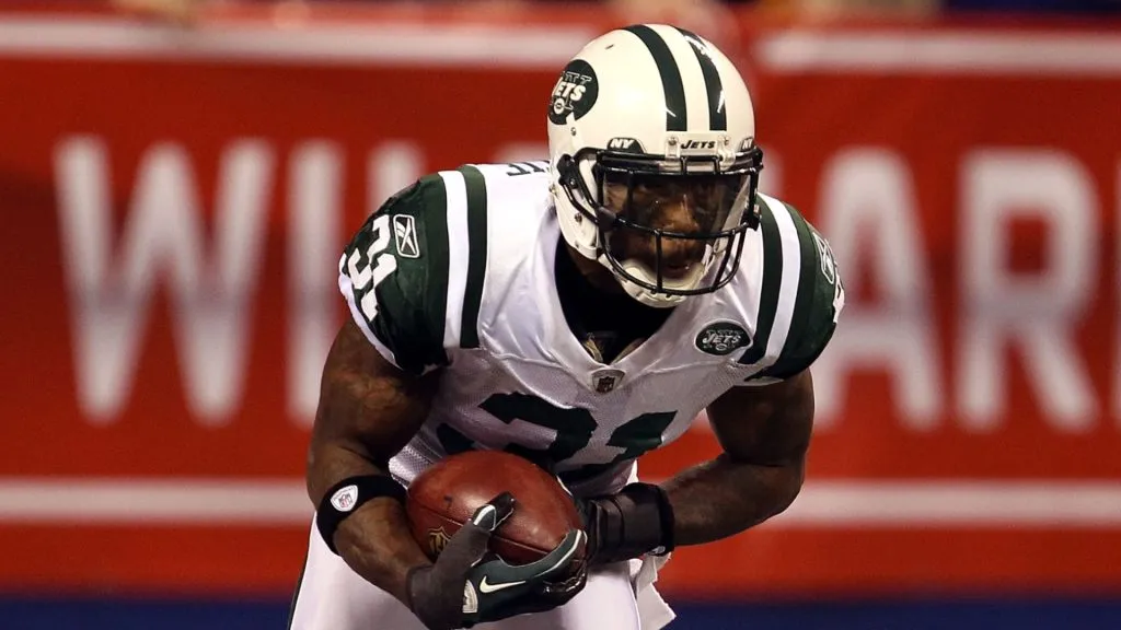 Antonio Cromartie #31 of the New York Jets fields a kickoff which he returns 47-yards in the final minute of the fourth quarter against the Indianapolis Colts during their 2011 AFC wild card playoff game at Lucas Oil Stadium on January 8, 2011 in Indianapolis, Indiana.
