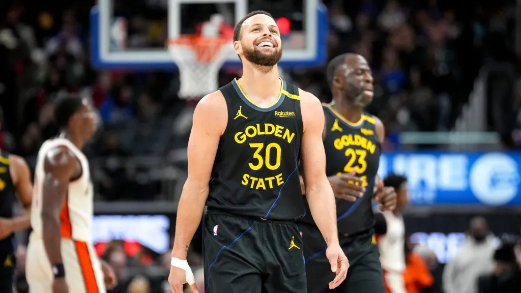 Stephen Curry #30 of the Golden State Warriors smiles during the first quarter against the Detroit Pistons at Little Caesars Arena. (Nic Antaya/Getty Images)