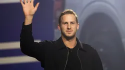 Detroit Lions quarterback Jared Goff waves to the crowd of media and guests at a Ford "Detroit Proud" event at the 2025 Detroit Auto Show at Huntington Place on January 9, 2025 in Detroit, Michigan. The Detroit Auto Show opens to the public on January 11th and runs through January 20th.