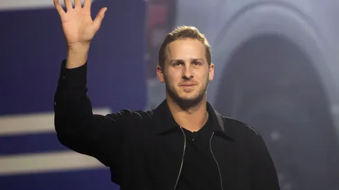 Detroit Lions quarterback Jared Goff waves to the crowd of media and guests at a Ford "Detroit Proud" event at the 2025 Detroit Auto Show at Huntington Place on January 9, 2025 in Detroit, Michigan. The Detroit Auto Show opens to the public on January 11th and runs through January 20th.