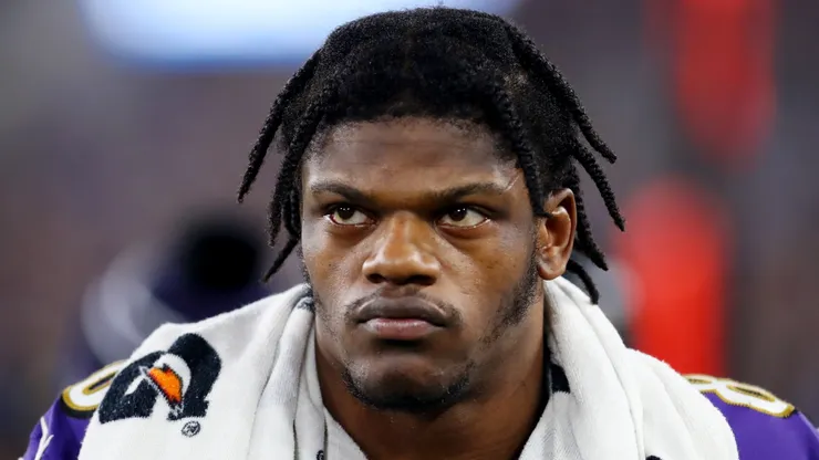 Lamar Jackson #8 of the Baltimore Ravens looks on during the the AFC Divisional Playoff game against the Tennessee Titans on January 11, 2020 in Baltimore, Maryland.