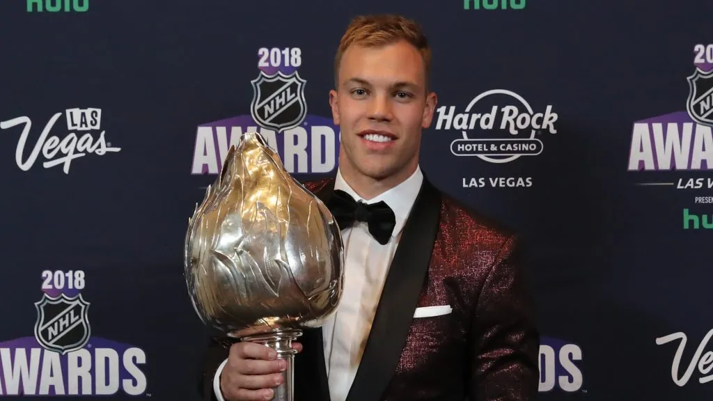 Taylor Hall of the New Jersey Devils poses with the Hart Trophy given to the most valuable player to his team in the press room at the 2018 NHL Awards presented by Hulu at the Hard Rock Hotel &amp; Casino on June 20, 2018 in Las Vegas, Nevada.
