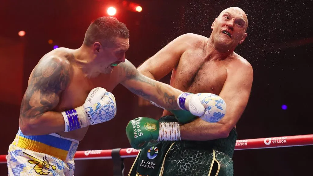 Oleksandr Usyk punches Tyson Fury during the IBF, WBA, WBC, WBO and Undisputed Heavyweight titles’ fight between Tyson Fury and Oleksandr Usyk at Kingdom Arena on May 18, 2024 in Riyadh, Saudi Arabia. (Photo by Richard Pelham/Getty Images)