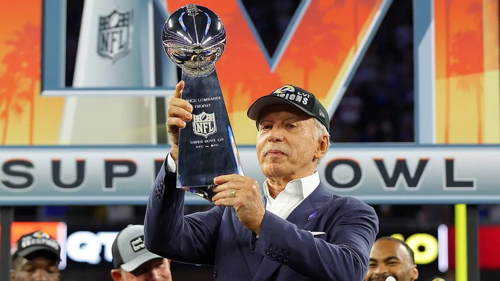 Owner of the Los Angeles Rames Stan Kroenke holds up the Vince Lombardi Trophy after Super Bowl LVI at SoFi Stadium on February 13, 2022. (Source: Kevin C. Cox/Getty Images)