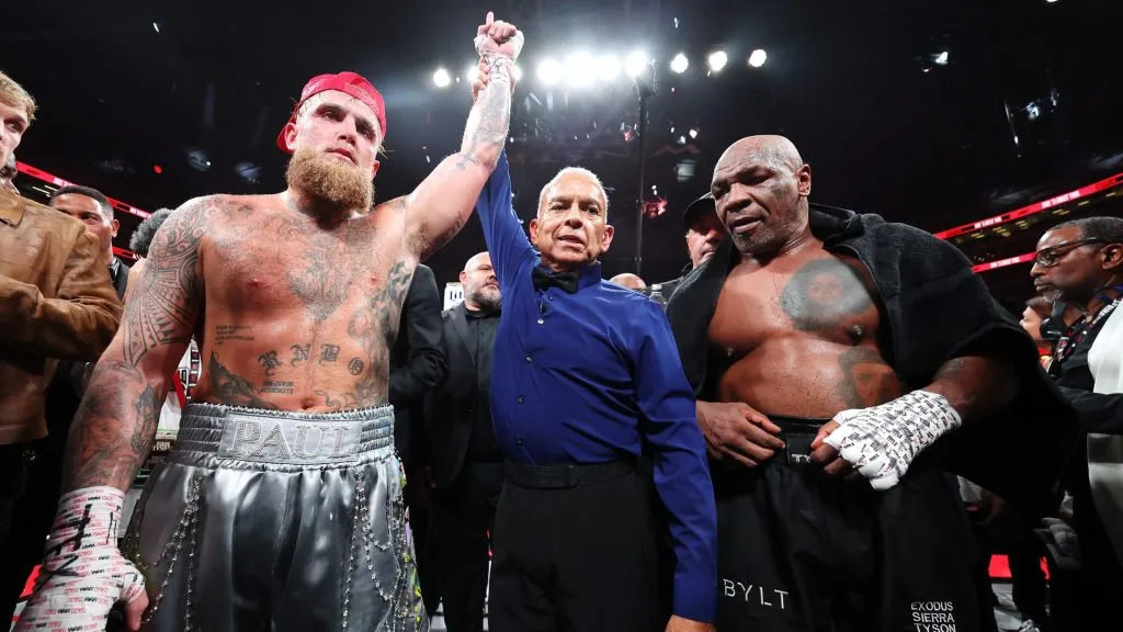 L-R) Jake Paul announced as winner against Mike Tyson during LIVE On Netflix: Jake Paul vs. Mike Tyson at AT&amp;T Stadium on November 15, 2024 in Arlington, Texas. (Photo by Al Bello/Getty Images for Netflix © 2024)