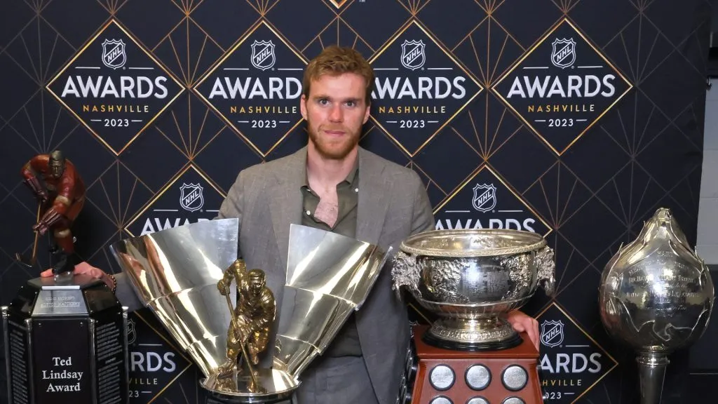 Connor McDavid of the Edmonton Oilers poses with the Ted Lindsay Award, Maurice Richard Trophy, Art Ross Trophy and the Hart Trophy during the 2023 NHL Awards at Bridgestone Arena on June 26, 2023 in Nashville, Tennessee.