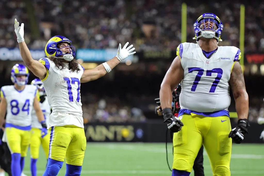  Puka Nacua #17 of the Los Angeles Rams celebrates alongside Alaric Jackson #77