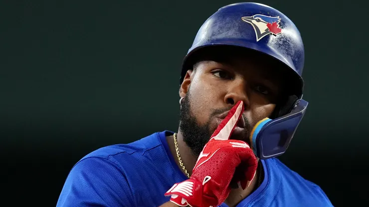 Vladimir Guerrero Jr. #27 of the Toronto Blue Jays celebrates as he runs the bases after hitting a solo home run during the seventh inning against the Texas Rangers at Globe Life Field on September 19, 2024 in Arlington, Texas.