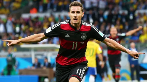 Miroslav Klose of Germany celebrates scoring his team's second goal during the 2014 FIFA World Cup Brazil Semi Final match between Brazil and Germany.