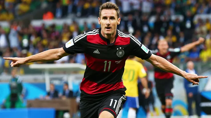 Miroslav Klose of Germany celebrates scoring his team's second goal during the 2014 FIFA World Cup Brazil Semi Final match between Brazil and Germany.