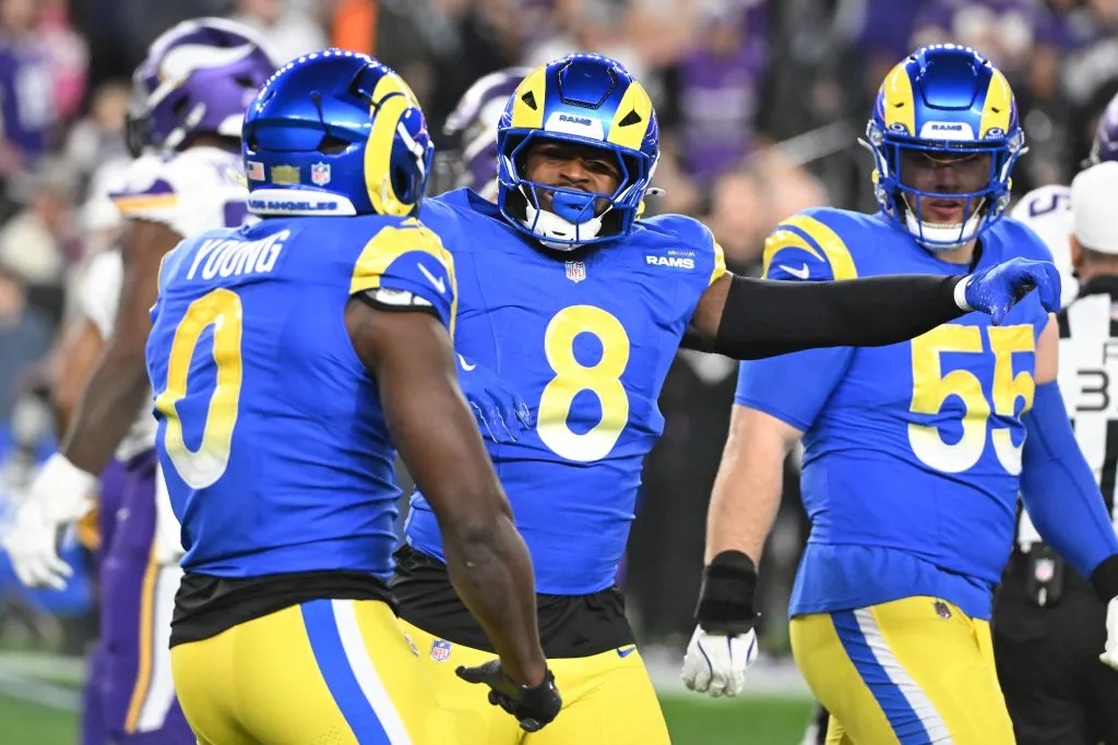 Byron Young #0 and Jared Verse #8 of the Los Angeles Rams