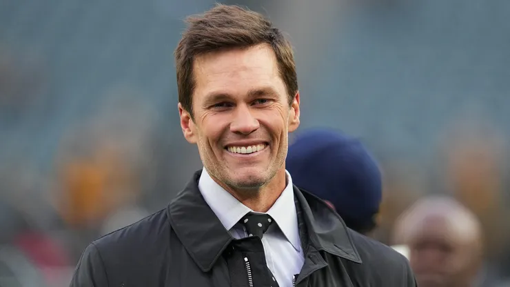 Tom Brady looks on from the field prior to an NFL football game between the Pittsburgh Steelers and the Philadelphia Eagles at Lincoln Financial Field on December 15, 2024 in Philadelphia, Pennsylvania.