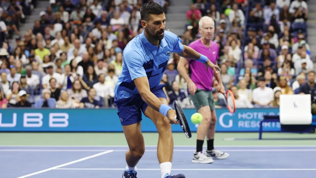 Former professional tennis player John McEnroe and Novak Djokovic play against former professional tennis player Andre Agassi and Carlos Alcaraz. (Sarah Stier/Getty Images)