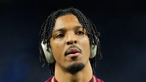 Jayden Daniels #5 of the Washington Commanders looks on during warmups prior to playing the Detroit Lions in the NFC Divisional Playoff at Ford Field on January 18, 2025 in Detroit, Michigan.