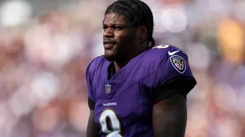 Lamar Jackson #8 of the Baltimore Ravens looks on as they play the Washington Commanders at M&T Bank Stadium on October 13, 2024 in Baltimore, Maryland.