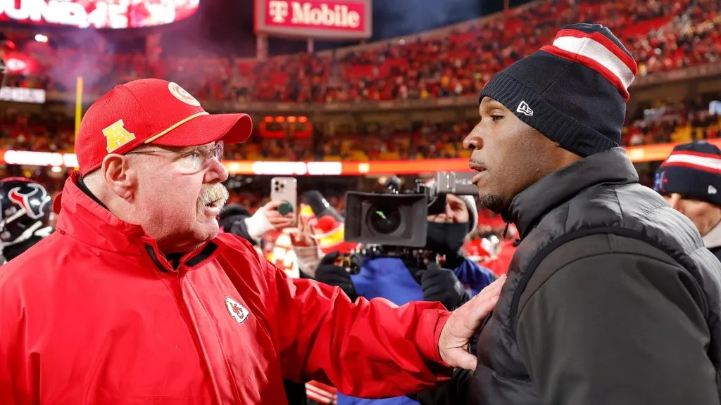 Head coach Andy Reid of the Kansas City Chiefs talks with head coach DeMeco Ryans of the Houston Texans after the AFC Divisional Playoff at GEHA Field at Arrowhead Stadium on January 18, 2025 in Kansas City, Missouri.