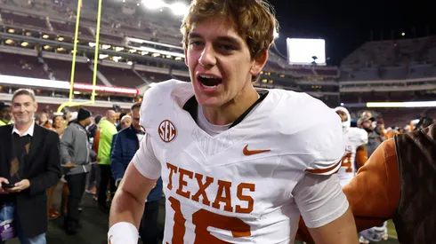 Arch Manning #16 of the Texas Longhorns reacts after defeating the Texas A&M Aggies 17-7 at Kyle Field on November 30, 2024 in College Station, Texas.