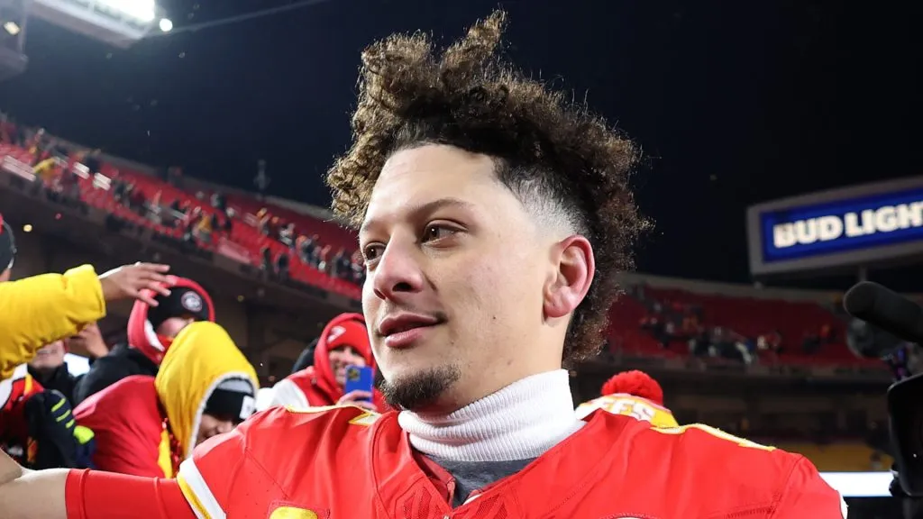 Patrick Mahomes #15 of the Kansas City Chiefs celebrates with fans after defeating the Houston Texans in the AFC Divisional Playoff at GEHA Field at Arrowhead Stadium on January 18, 2025 in Kansas City, Missouri.