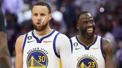 Stephen Curry #30 of the Golden State Warriors and Draymond Green #23 react during the fourth quarter in game seven of the Western Conference First Round Playoffs against the Sacramento Kings.